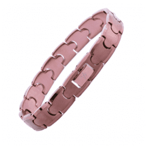 A pink bracelet with a puzzle pattern on it.