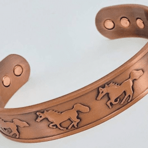 A copper bracelet with horses on it.