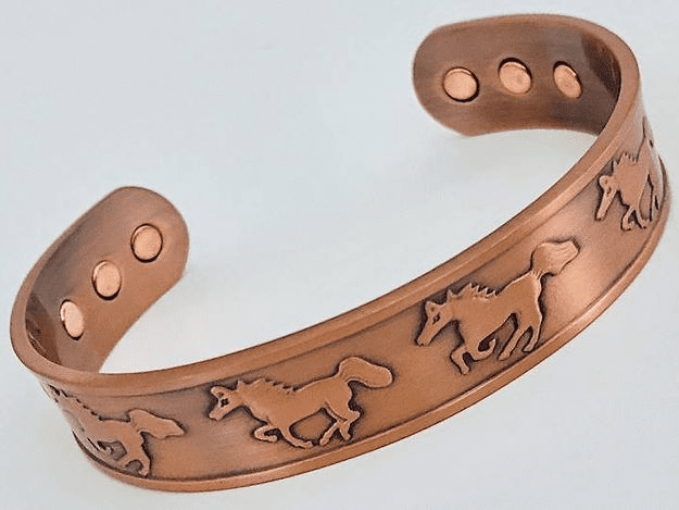 A copper bracelet with horses on it.