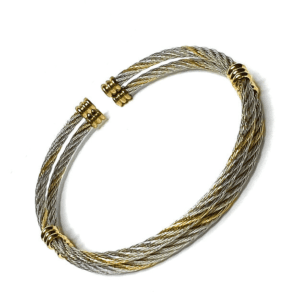 A pair of silver and gold bracelets.