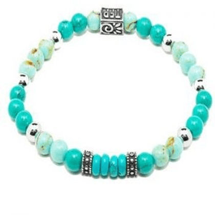 A bracelet with turquoise and silver beads.