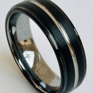 A black and silver ring is shown on the picture.