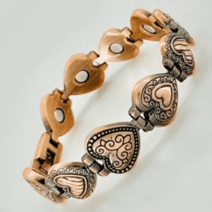 A bracelet with hearts on it is shown.