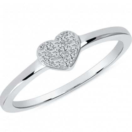 A white gold ring with a heart shaped diamond.